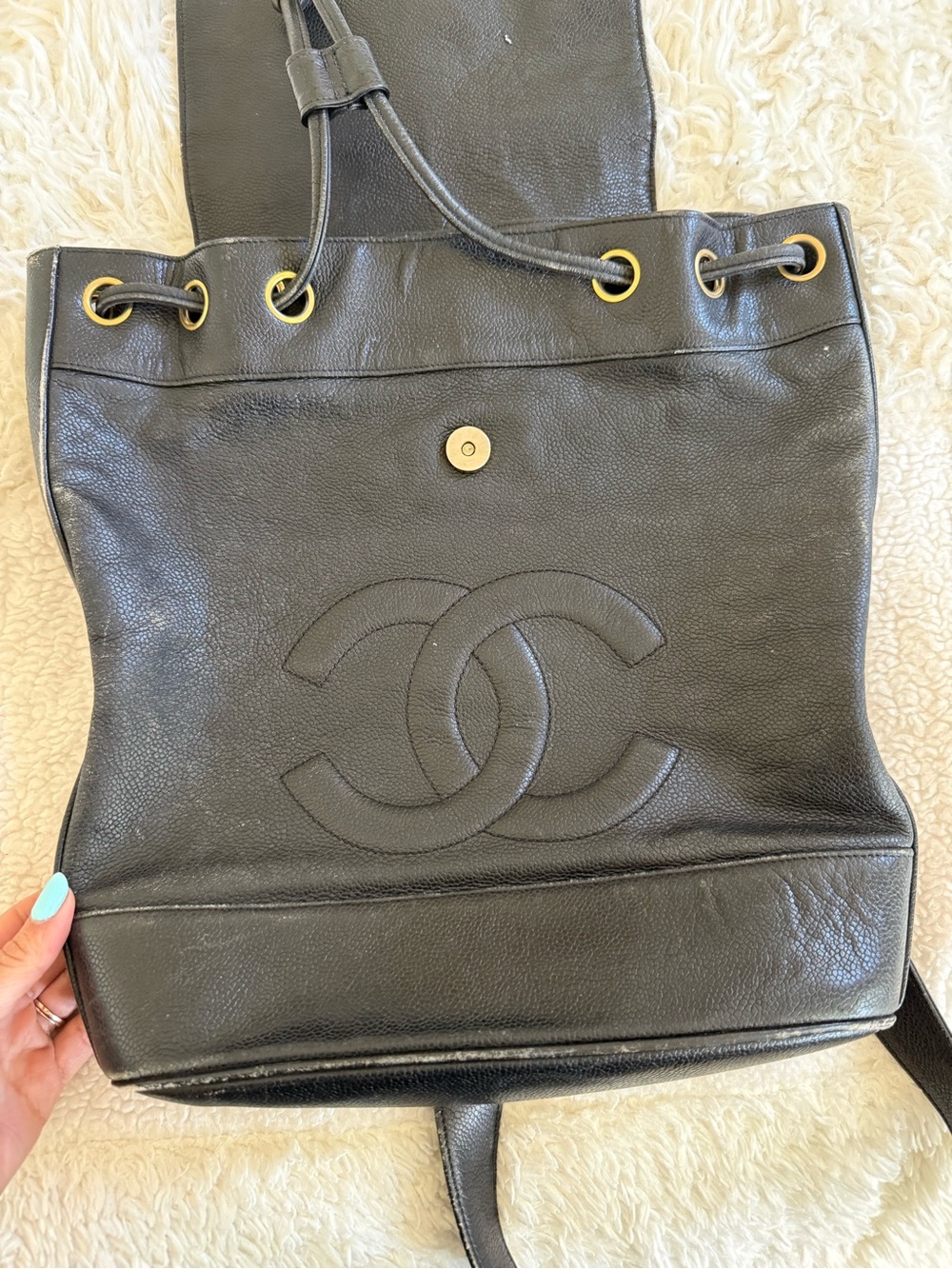 CHANEL Black Caviar Leather Drawstring Backpack with Gold-Tone Eyelets